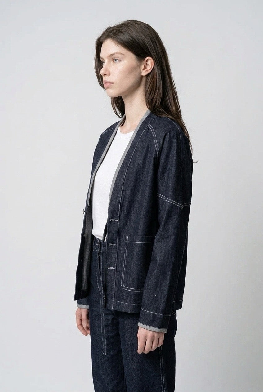 Side profile showing the relaxed drape of the drop-shoulder sleeve