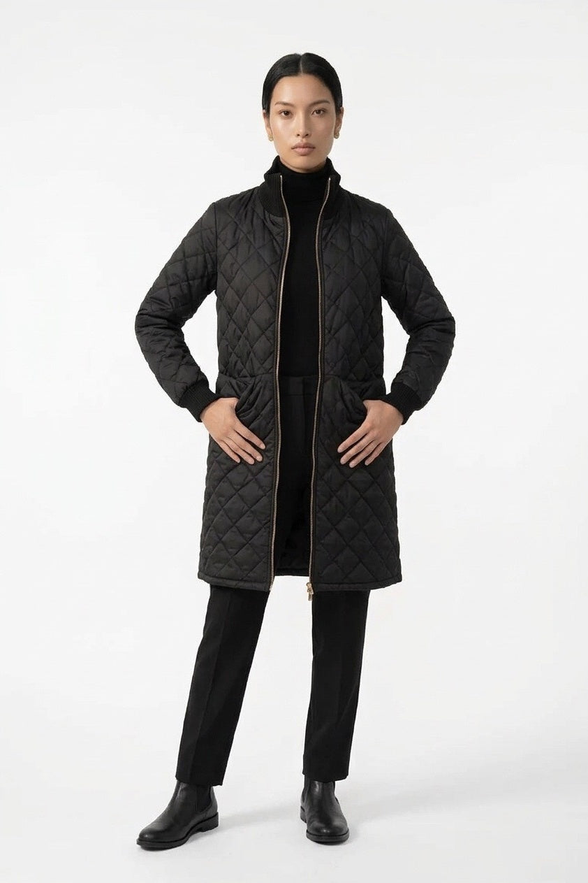 Black Junction Bomber Jacket – front view, worn open, hands in pockets